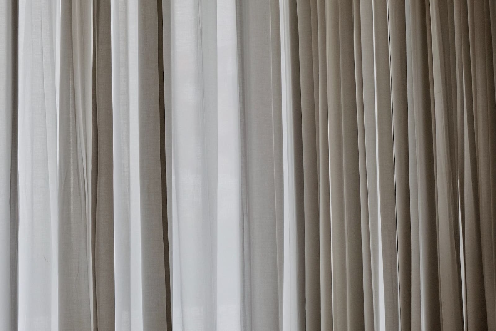 how-to-hang-pencil-pleat-curtains-on-a-track