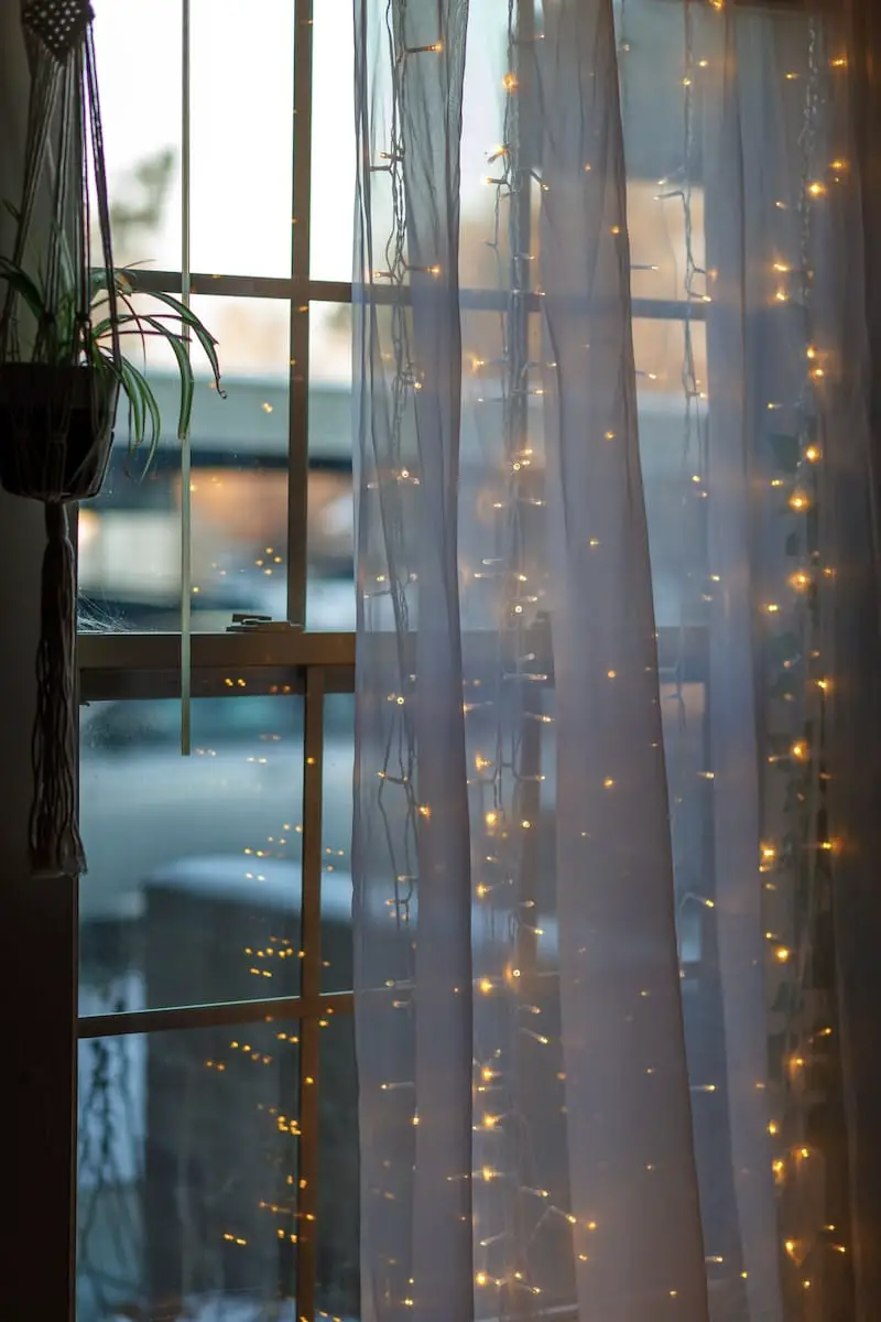 how-to-hang-fairy-lights-behind-curtains